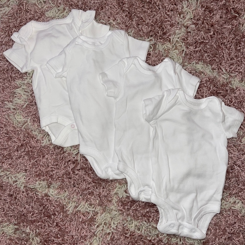 Brand new onesies never worn